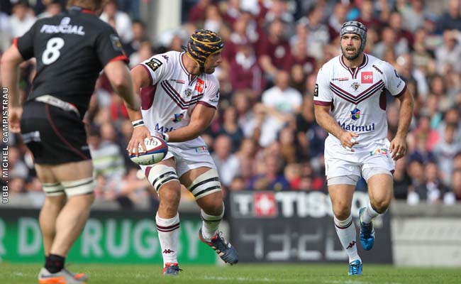 Botha s'apprête à servir Rey devant Galand 